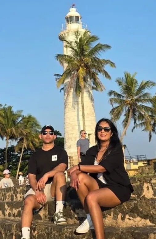 Travelers at the Galle Fort lighthouse